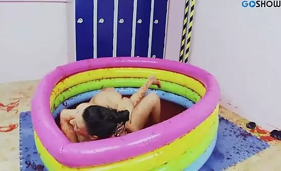 Lesbian Brunettes Diving into Kinky Inflatable Pool Playtime